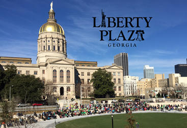 Photo of Liberty Plaza with logo in the sky